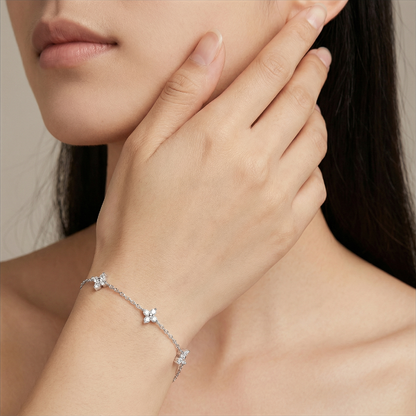 The "Bloom-in-Light" Bracelet: Lab-Grown Moissanite 4-Petal Flower Chain in Rhodium-Finished Silver
