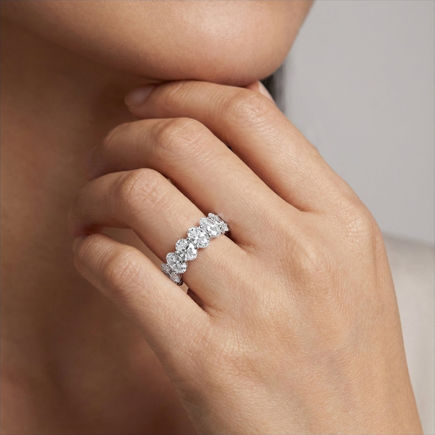 Timeless Oval Cut Simulated Diamond Eternity Band in Sterling Silver - Classic Elegance for Every Occasion